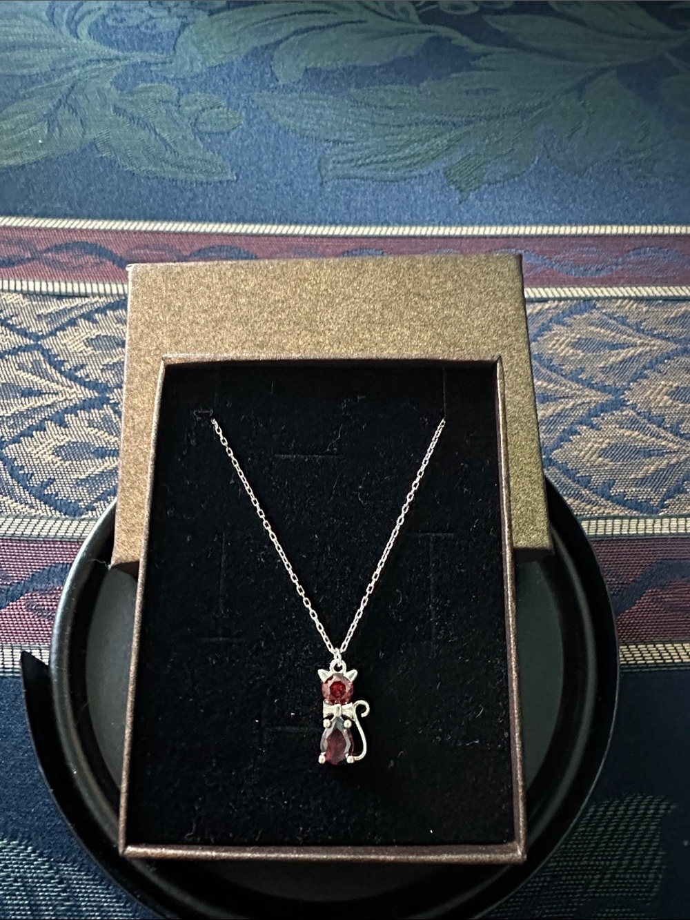 Silver Cat Pendant Necklace with Red Gemstone